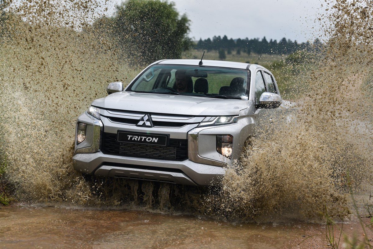 NEW MITSUBISHI TRITON TOUGHENS UP NEW MITSUBISHI TRITON TOUGHENS UP