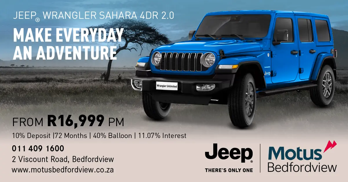 Blue Jeep Wrangler out in the Sub-Saharan Desert
